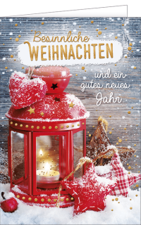 Weihnachtskarte mit einer Laterne und Text